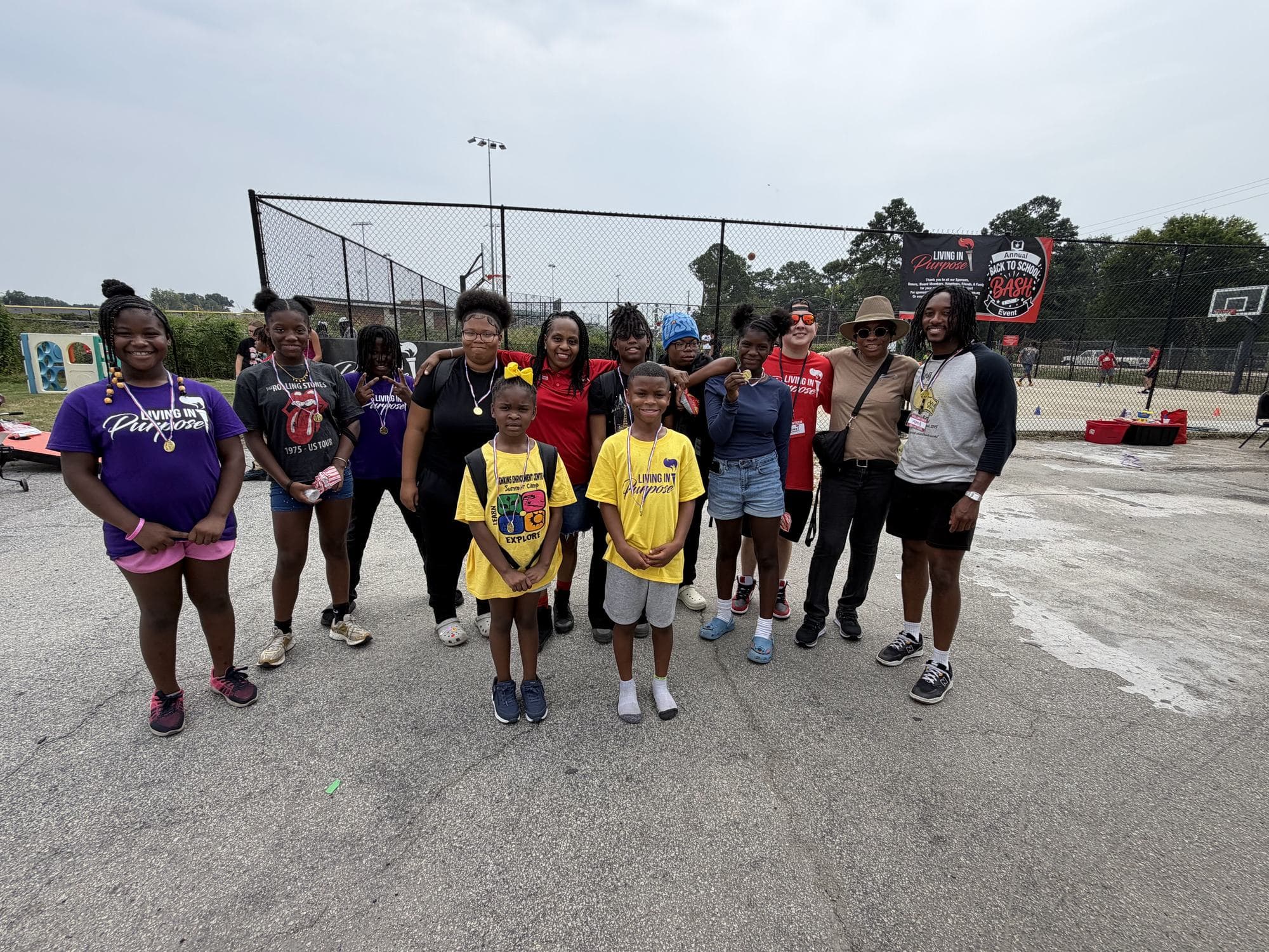 Living in Purpose students and staff together at a community event in Augusta